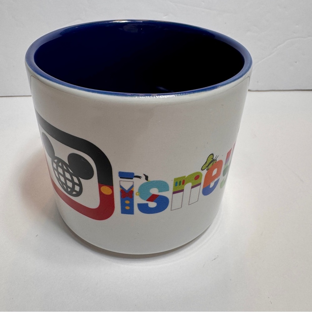 NWT Disney Coffee Mug with Character Logo. stackable Walt Disney World mug